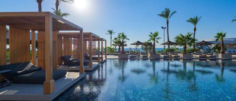 Outdoor pool, pool umbrellas, pool loungers