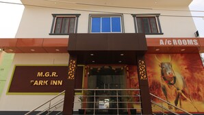 A hotel with a sign for "M.G.R. Park Inn" and "A/C Rooms" on the facade. - M.G.R. Park Inn (Viluppuram)