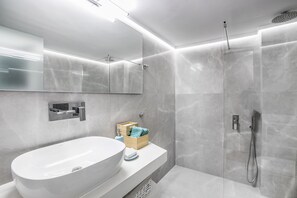 Shower, hair dryer, towels, soap