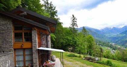 Chalet 'Baita Al Rossat' with Mountain Views, Garden and Wi-Fi
