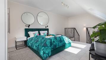 1 bedroom, desk, iron/ironing board, travel crib
