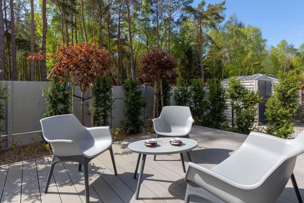 Terrace with garden furniture, where you can enjoy a cup of coffee.