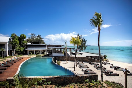 Outdoor pool, pool umbrellas, sun loungers