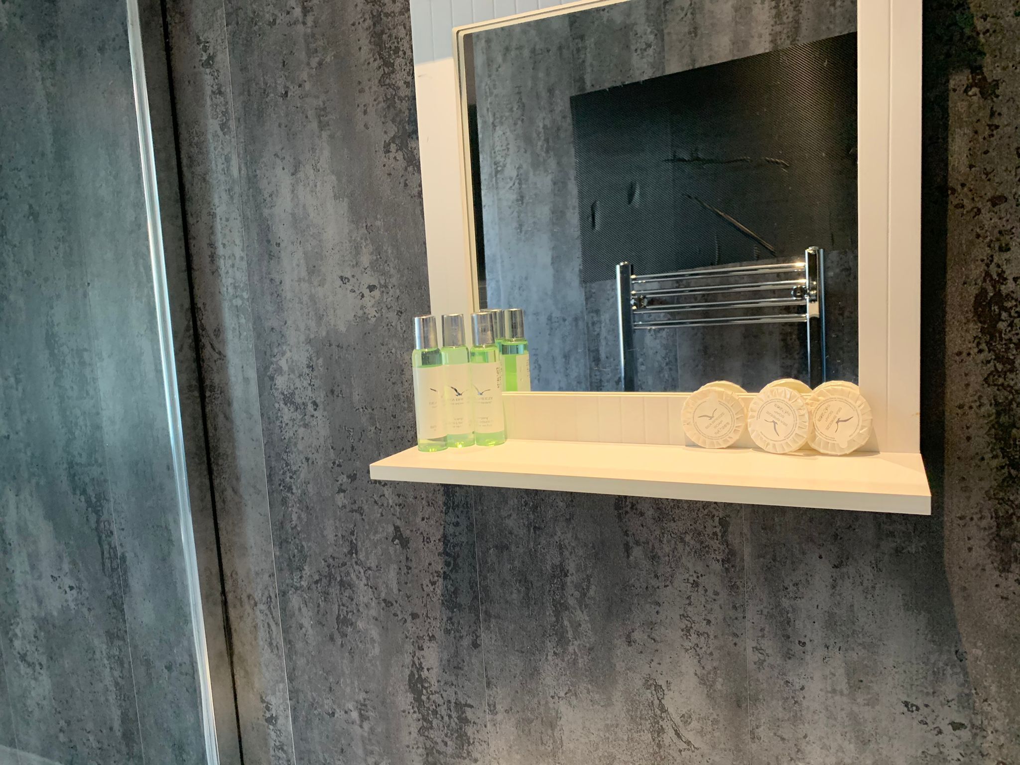 Combined shower/tub, hair dryer, towels, soap