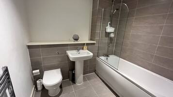 Apartment, 1 Queen Bed | Bathroom | Combined shower/bathtub, deep-soaking bathtub, hair dryer, towels