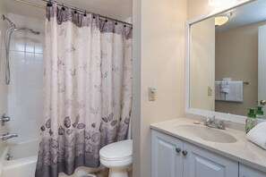 Bathtub, hair dryer, towels, soap