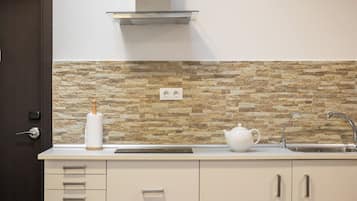 Mini-fridge, microwave, oven, stovetop