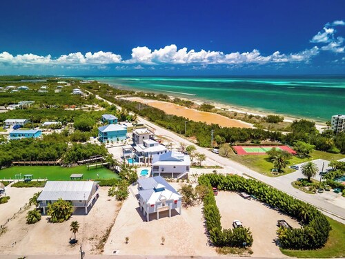 Martin`s Beach House Coco Plum Dream on Avenue G 4 bedroom 3 bath with pool and jacuzzi and 30 ft of dockage