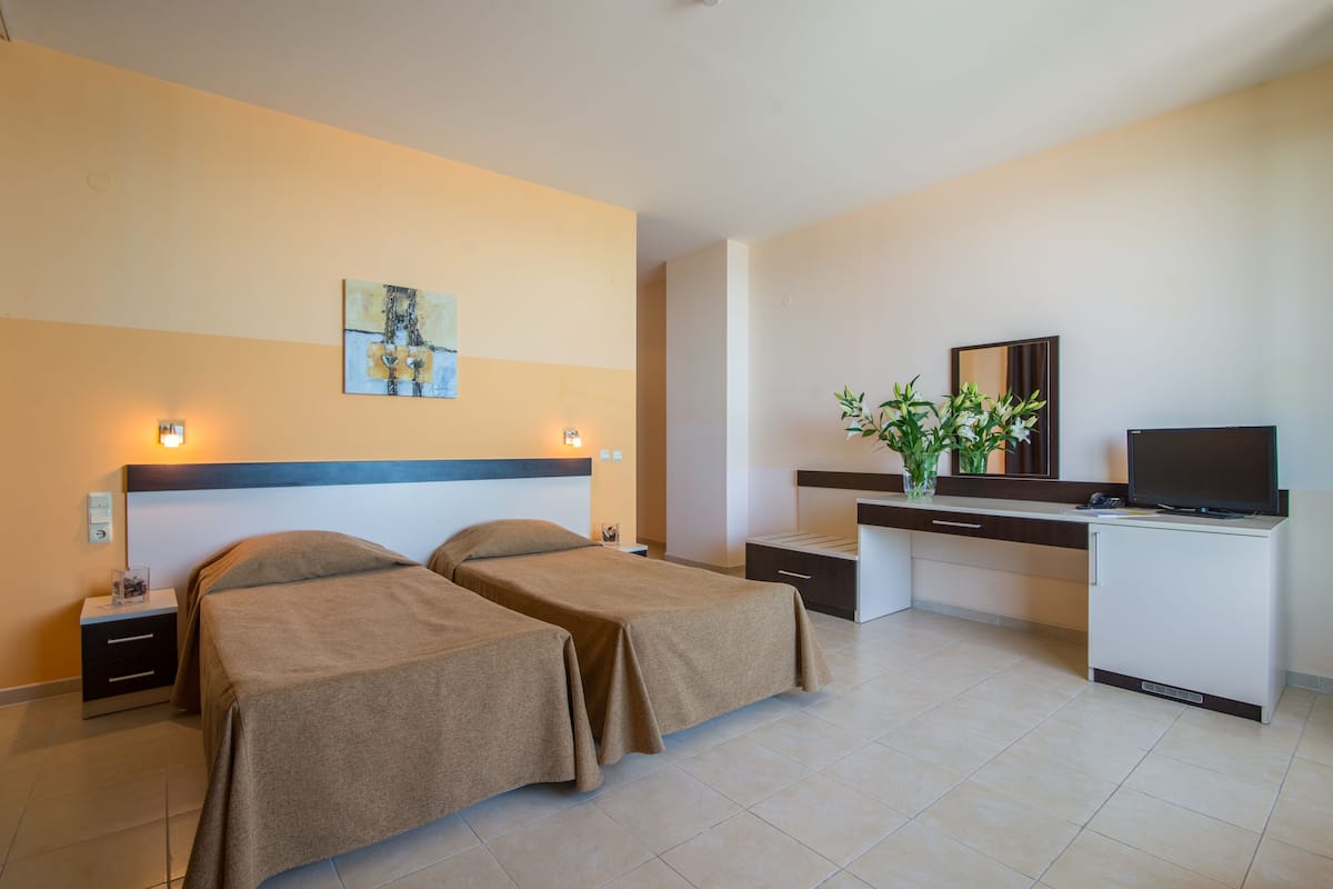 Comfort Twin kamer | Een strijkplank/strijkijzer, gratis wifi, beddengoed
