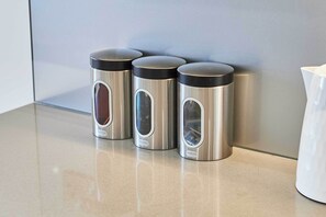 Shower, hair dryer, towels, shampoo