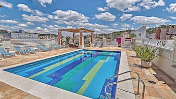 Indoor pool, outdoor pool, open 8:00 AM to 7:00 PM, sun loungers