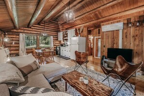 Cabin, 2 Bedrooms | Living area | Computer monitors - 76gs - Genuine Log Cabin - Wifi - Pets Ok - Sleeps 4 2 Bedroom Home by RedAwning (Deming)