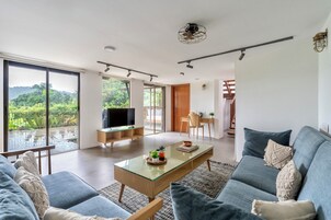 Mango Villa | Living room | 32-inch TV with cable channels