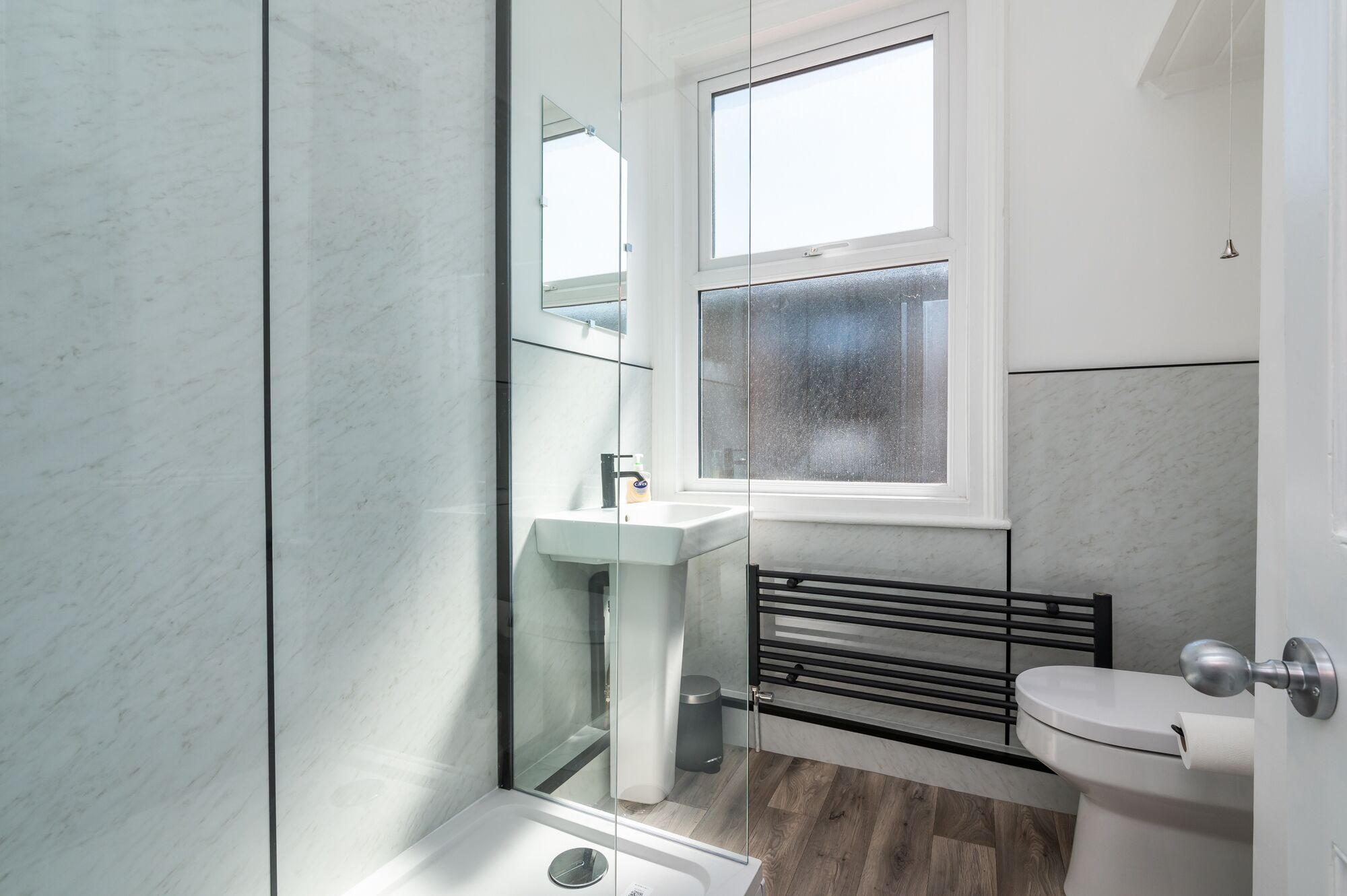Shower, rainfall showerhead, hair dryer, towels
