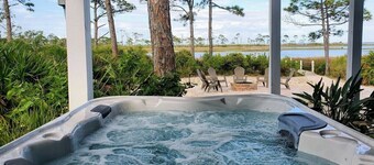 Bay Front w Dock! Hot tub, Beach across the street, Pet friendly 