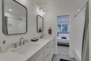 Bathtub, hair dryer, shampoo