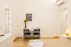 1 dormitorio, tabla de planchar con plancha, cuna de viaje y wifi gratis