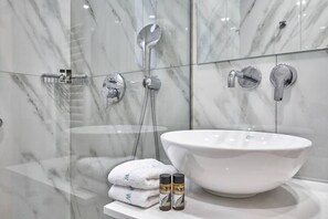 Hair dryer, towels, shampoo