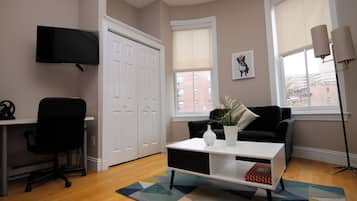 30-inch flat-screen TV with satellite channels, TV
