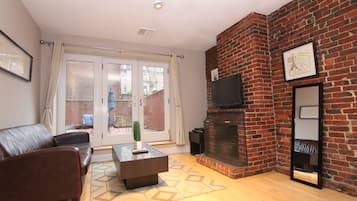 Apartment, 2 Bedrooms | Living area | 30-inch flat-screen TV with satellite channels, TV