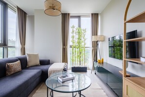 Deluxe Apartment | Living area | 43-inch Smart TV with digital channels, TV - As Maslak by NewInn (Sariyer)