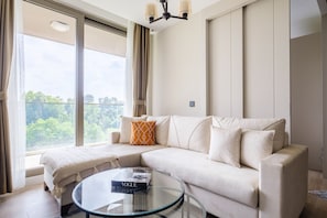 Deluxe Apartment | Living area | 43-inch Smart TV with digital channels, TV