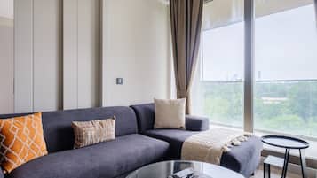 Deluxe Apartment | Living area | 43-inch Smart TV with digital channels, TV