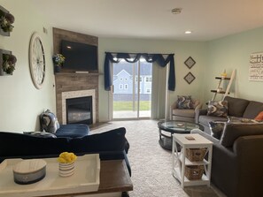 Smart TV, fireplace, books