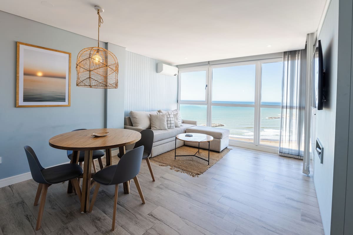 Superior Apartment | Living area | 50-inch TV with satellite channels, heated floors