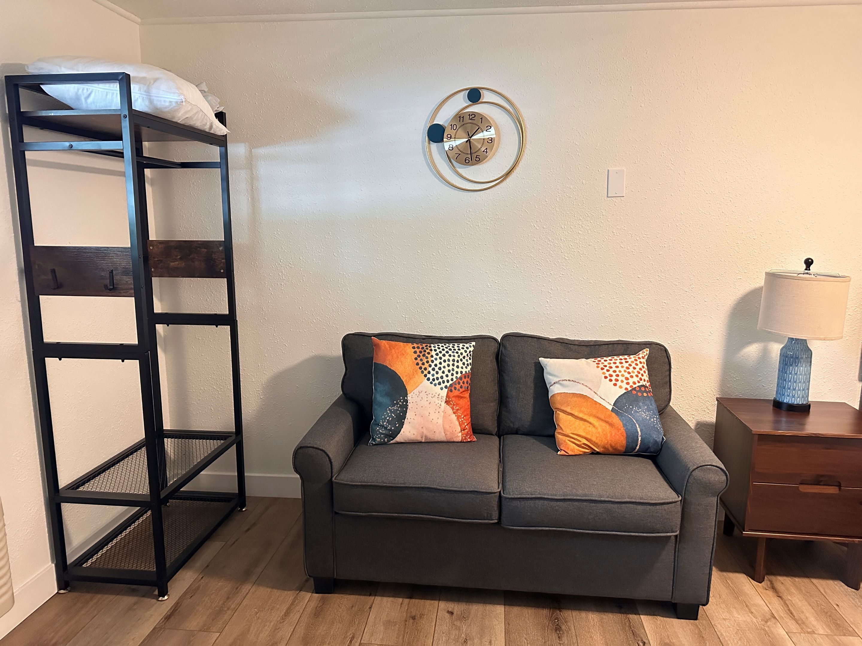 standard single room, 1 queen bed with sofa bed, refrigerator & microwave | living area | 45-inch flat-screen tv with cable channels