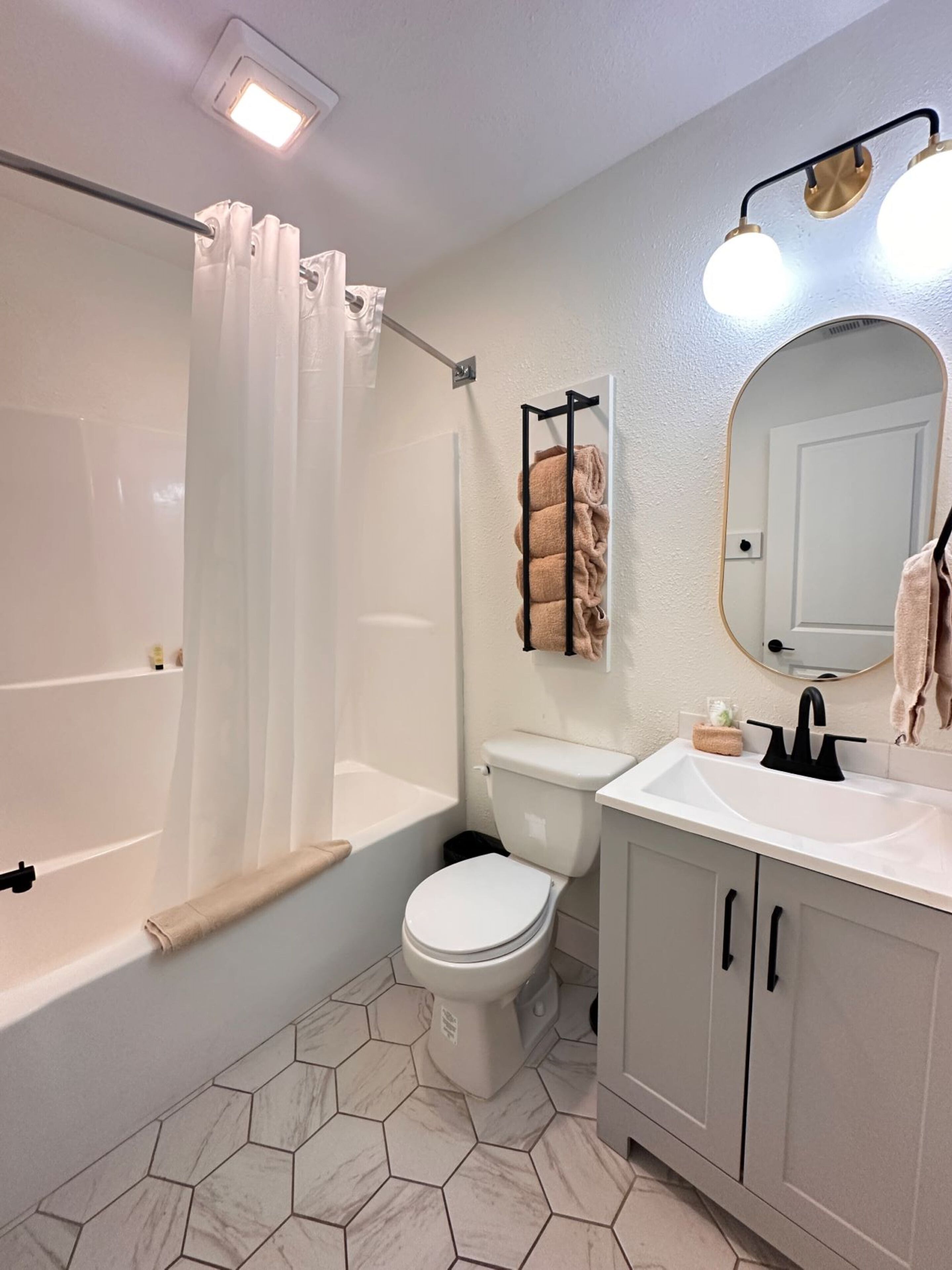 family suite | bathroom | shower, towels, soap, shampoo