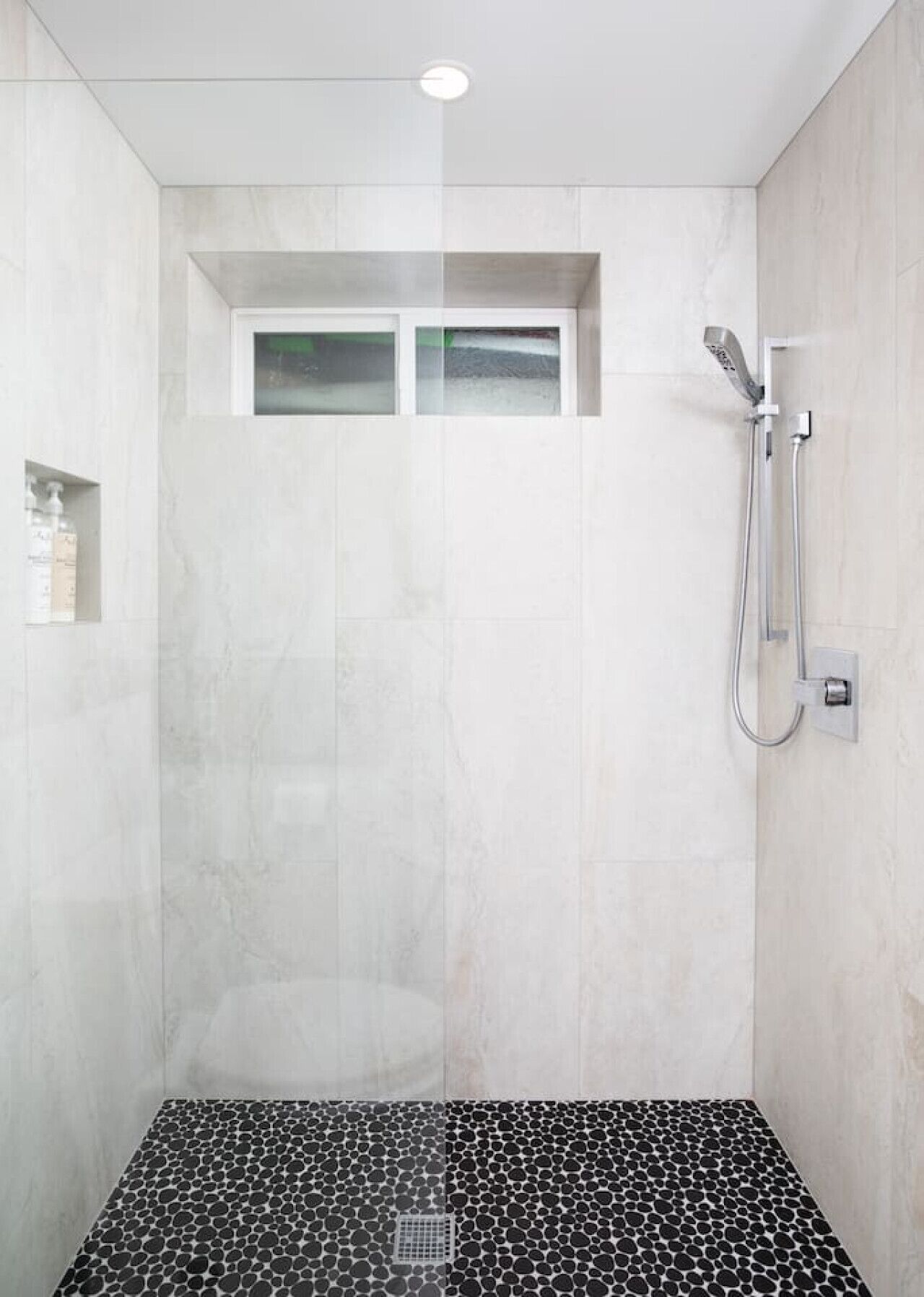 Combined shower/tub, hair dryer, towels, soap
