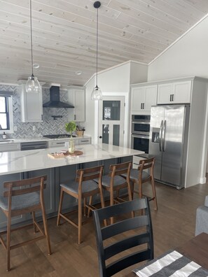 Kitchen islands - Mona Lake Living - Awesome lake frontage with kid friendly beach (Norton Shores)
