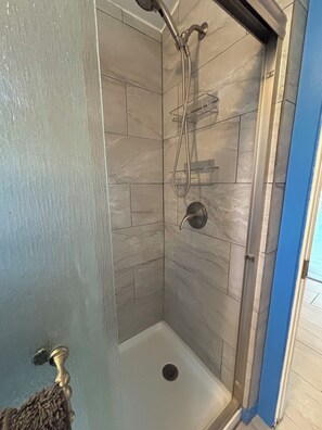 Shower, towels, soap, shampoo