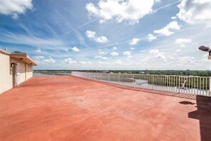 Enjoy breathtaking views of the surrounding landscape from this rooftop terrace.