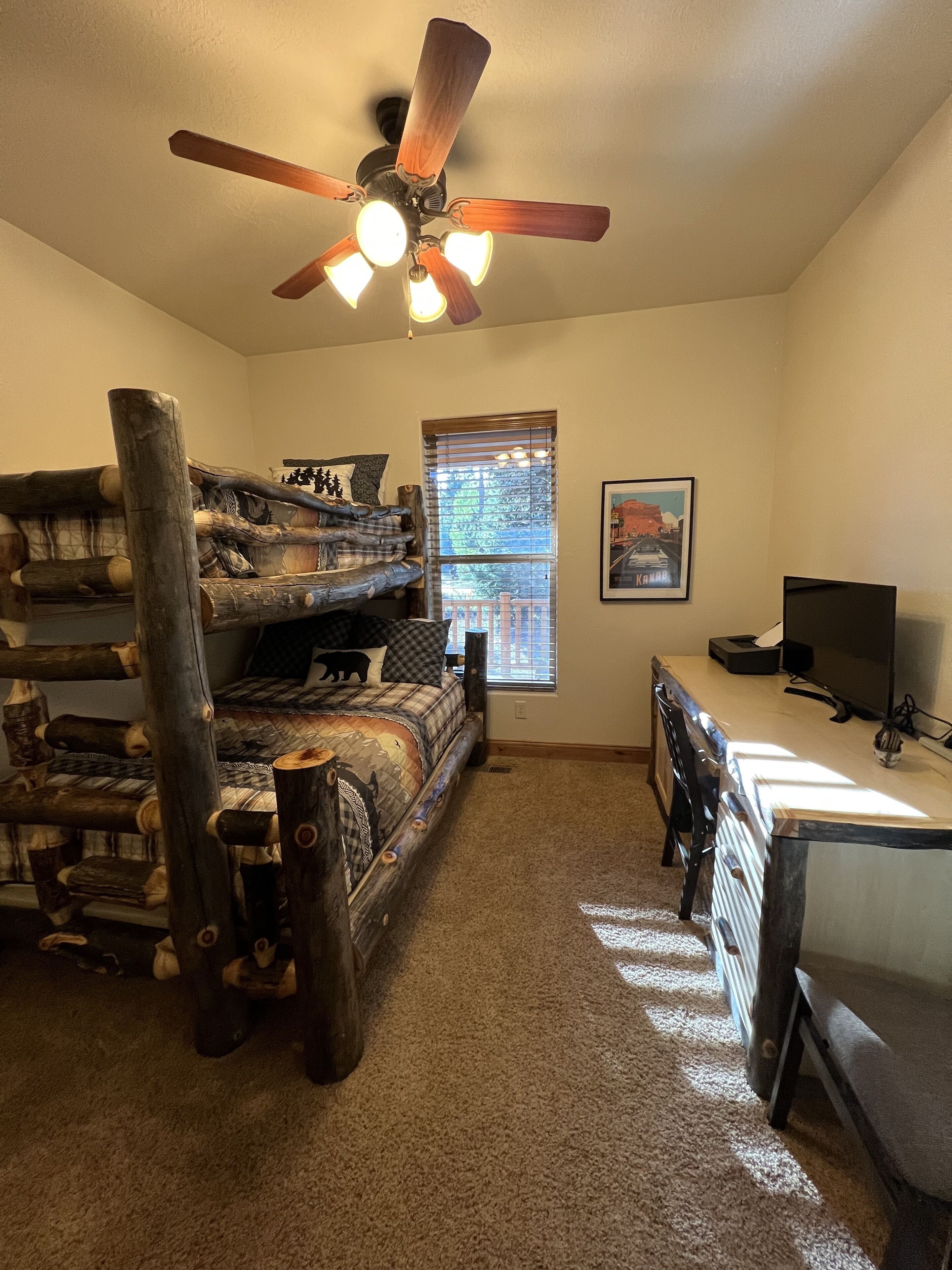 Bunk Beds and desk with monitor and copier
