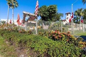 Experience Muggle's Cove, a themed attraction where you can feed the alligator.