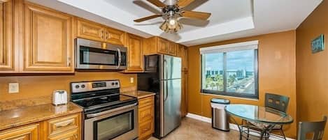 Coffee/tea maker, fridge, microwave, oven