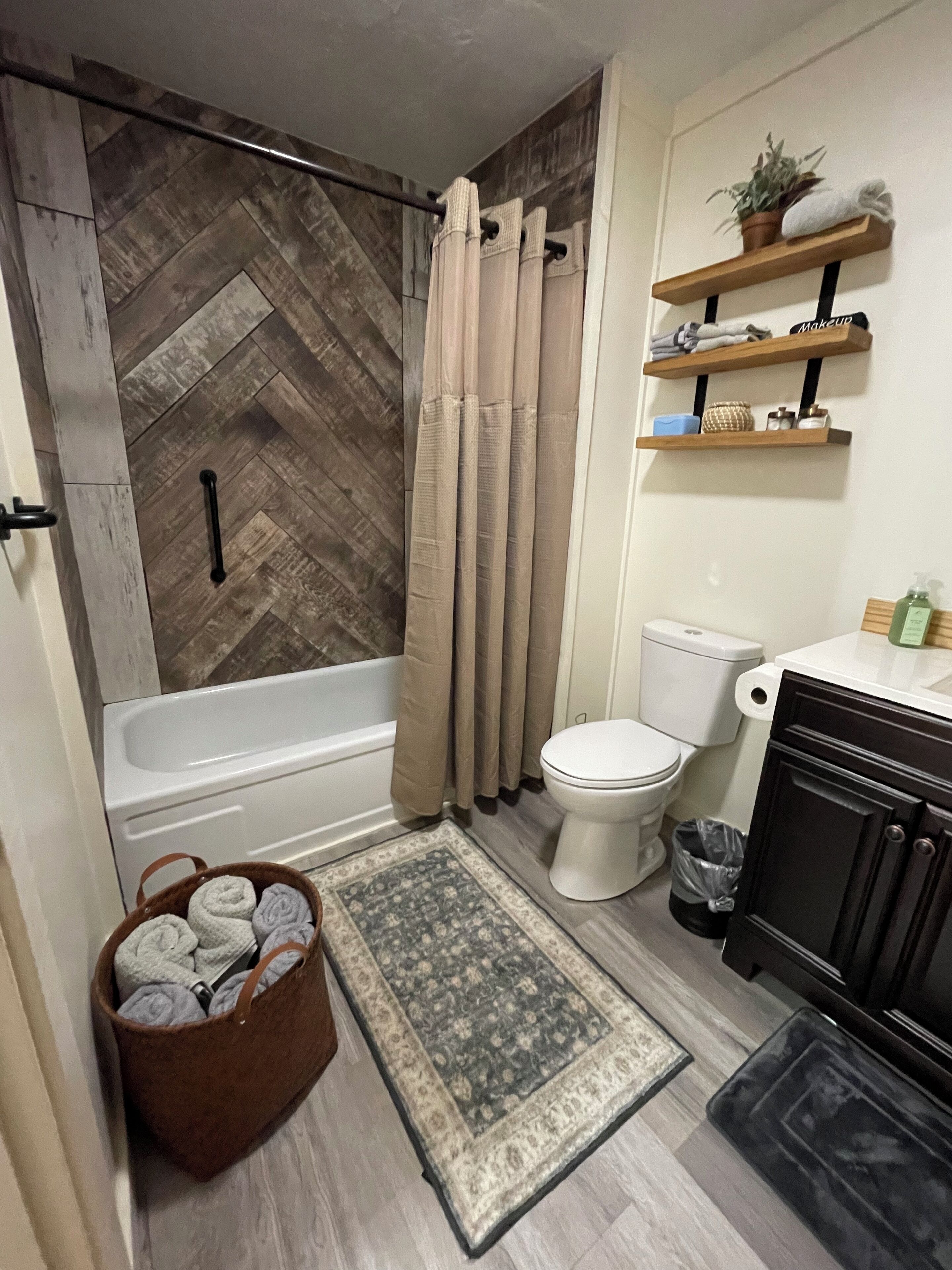 Combined shower/tub, hair dryer, towels, soap
