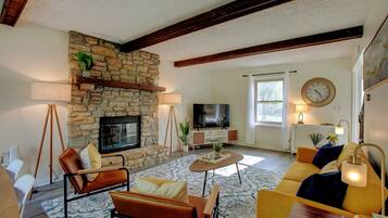 Smart TV, fireplace, books