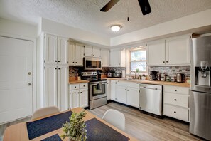 Fridge, microwave, oven, stovetop - Large 4BR house w/ a Downstairs Bedroom! Fenced Yard+Dog friendly+WFH (Indianapolis)