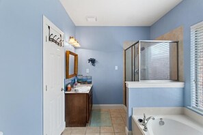 Combined shower/tub, hair dryer, towels, soap
