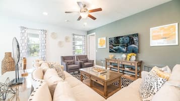 Een televisie, videogames en een tafeltennistafel