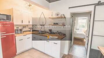 Fridge, microwave, stovetop, coffee/tea maker