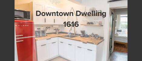 Fridge, microwave, stovetop, coffee/tea maker