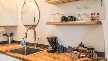 Fridge, microwave, stovetop, coffee/tea maker