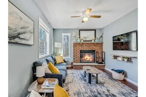 Smart TV, fireplace, foosball, books
