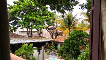 Habitación Confort, vista al jardín | 1 habitación, escritorio, wifi gratis y ropa de cama