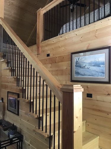 Cozy A-Frame cabin right next to the water.