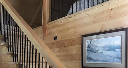 Cozy A-Frame cabin right next to the water.